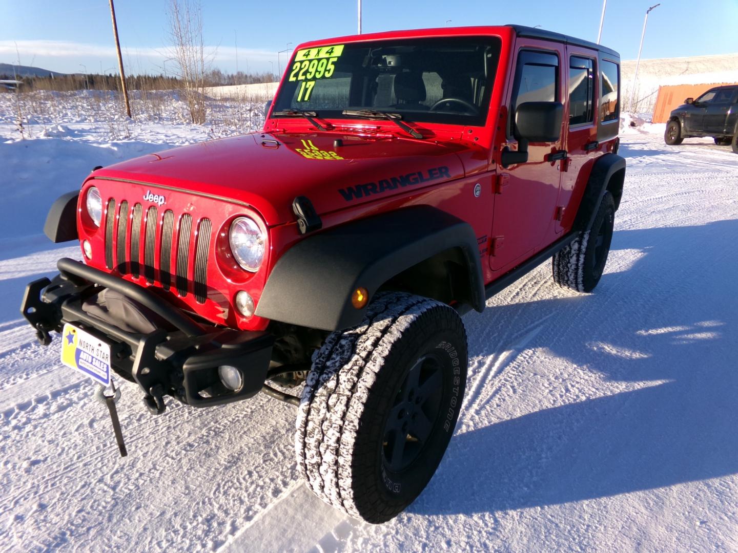 2017 Red Jeep Wrangler Unlimited Sport 4WD (1C4BJWDG9HL) with an 3.6L V6 DOHC 24V FFV engine, 6-Speed Manual transmission, located at 2630 Philips Field Rd., Fairbanks, AK, 99709, (907) 458-0593, 64.848068, -147.780609 - Photo#0